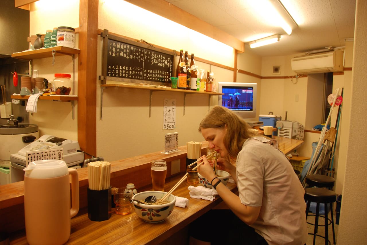 Slurping ramen in the backstreets of Dōtonbori (6453156731)