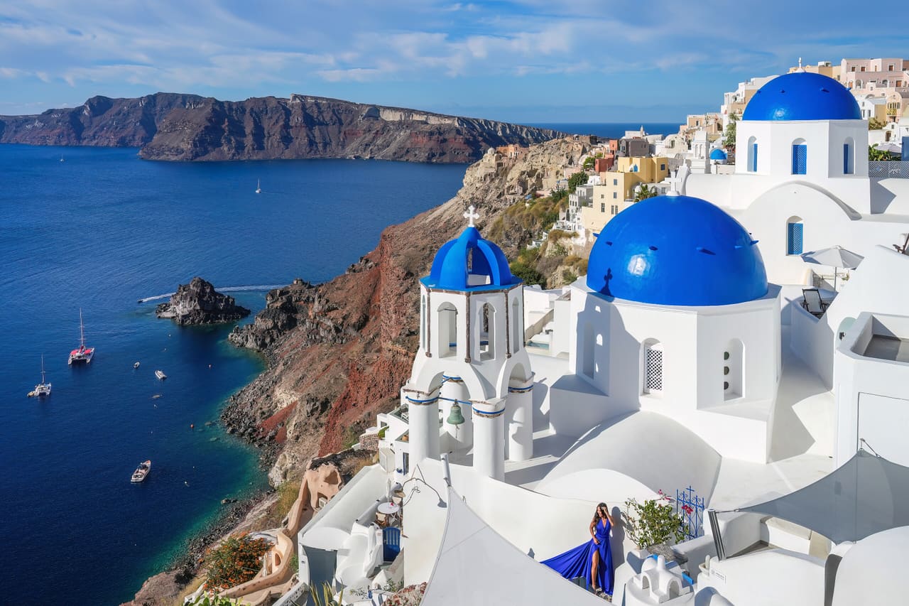1000 Three domes of Oia in Santorini Photo by Giles Laurent