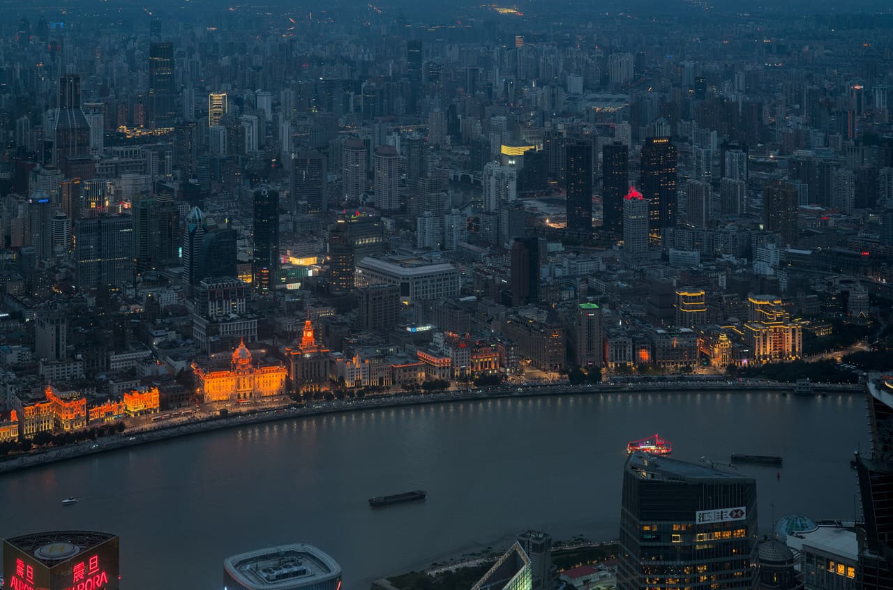 Blue hour view of the Bund from the Shanghai World Financial Center dllu